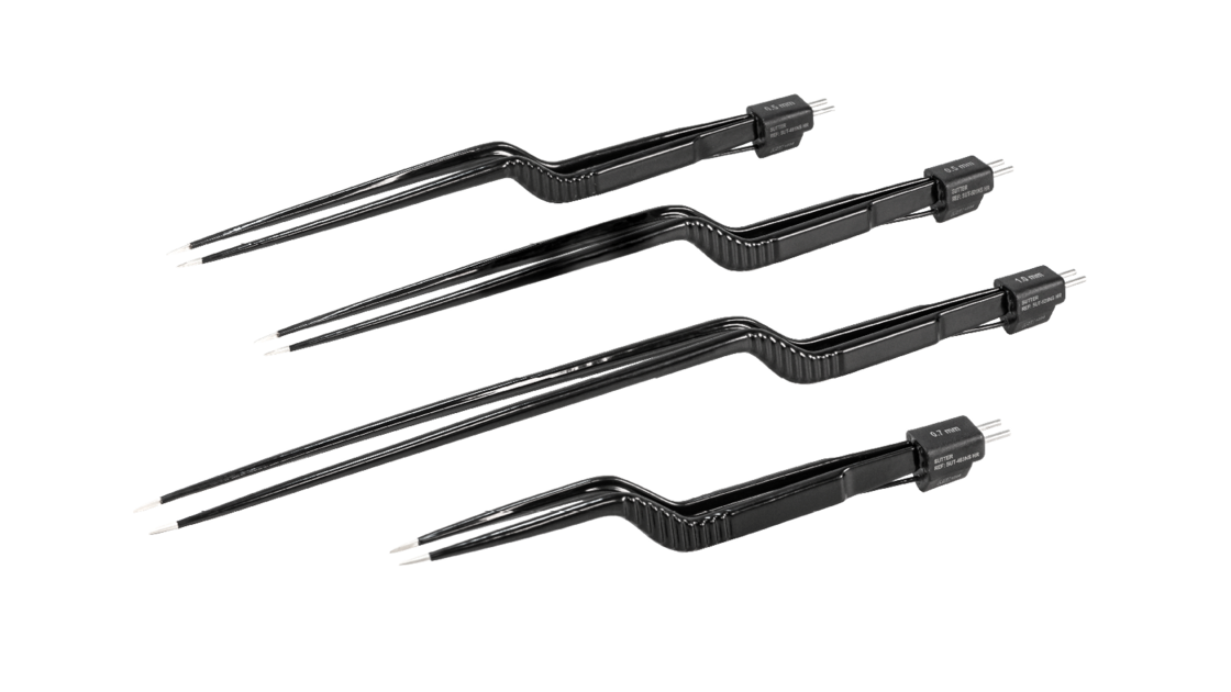Four black bipolar irrigation forceps with angled tips, arranged diagonally